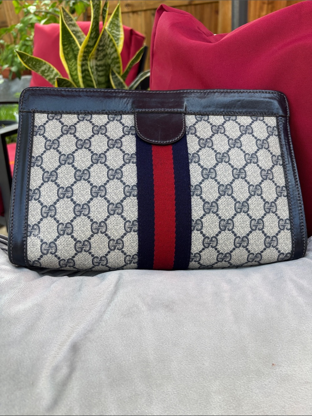 Gucci  GG Supreme Canvas Clutch with Blue and Red Web Stripe